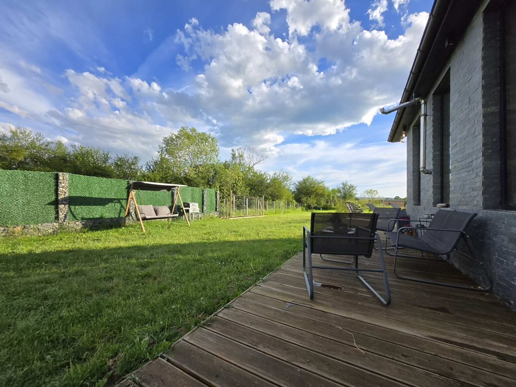 Garden and deck with countryside view