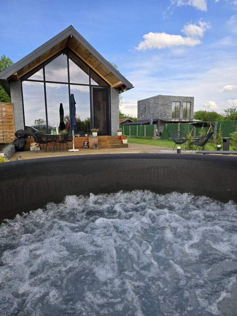 Hot tub with villa in background
