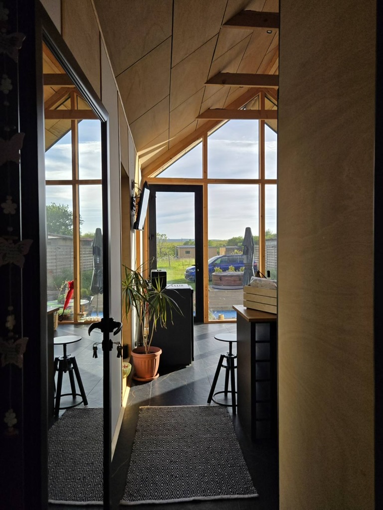 Entry and interior with high ceilings